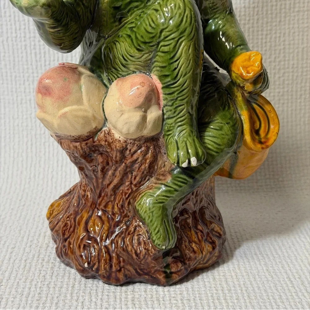 Antique Collectible Monkey Holds Fruits and Water bag.